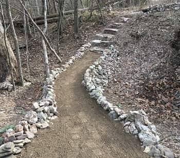 Stone bridge and stairs across a ravine